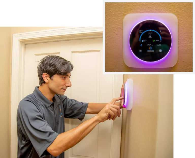 Tegridy Air technician installing a smart thermostat